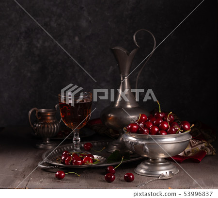 Vintage still life with ripe cherry and pewter Vintage still life with ripe cherry and pewter 53996837