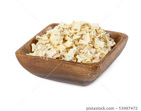Dried sliced celery root in wooden bowl 53997472
