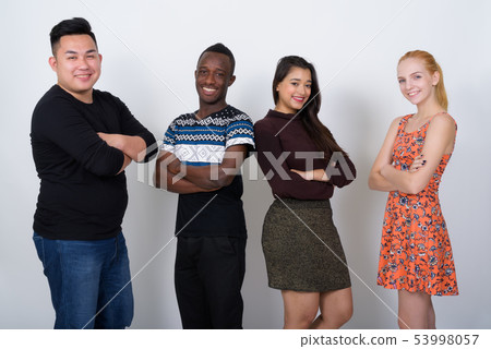 Studio shot of happy diverse group of multi ethnic friends smili Studio shot of happy diverse group of multi ethnic friends smili 53998057