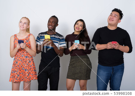 Studio shot of happy diverse group of multi ethnic friends smili Studio shot of happy diverse group of multi ethnic friends smili 53998108