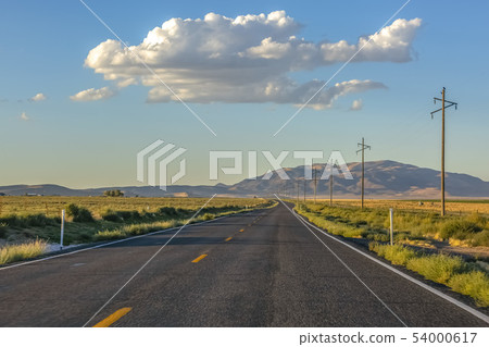 Highway 68 with view of horizon on a sunny day 54000617