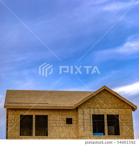 Front roof of home under construction copy space Front roof of home under construction copy space 54001592