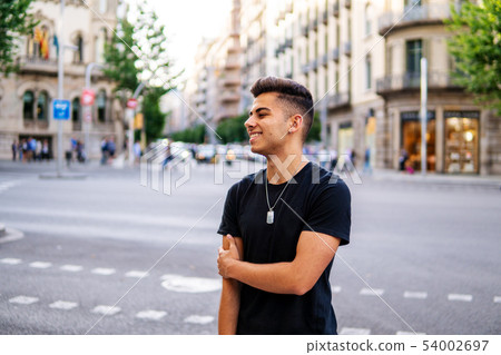 fashionable handsome man on the street of modern city 54002697