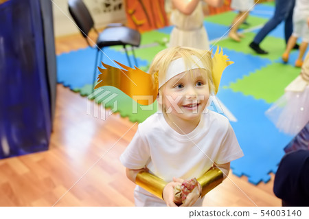 Little boy involved in performance children's Little boy involved in performance children's 54003140