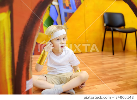 Little boy involved in performance children's Little boy involved in performance children's 54003148