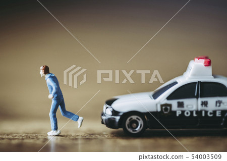 Miniatures, people, police cars Miniatures, people, police cars 54003509