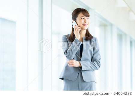 Business woman making phone call Business image Female employee 54004288