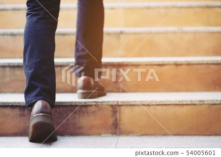 Close up legs shoes of young business man Close up legs shoes of young business man 54005601