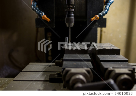 Part machining at machining center 54010053