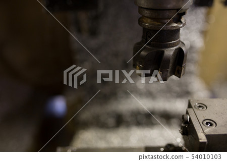 Part machining at machining center 54010103