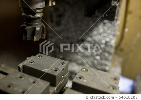 Part machining at machining center 54010105