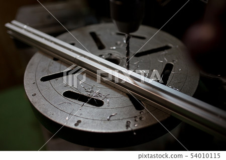 Parts processing with drilling machine 54010115