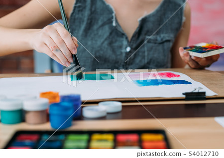 contemporary art painter creating abstract artwork 54012710