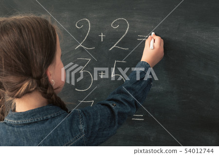 primary school education girl do math chalkboard 54012744
