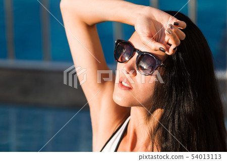cute lady in a pool cute lady in a pool 54013113