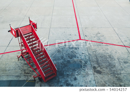 Red passenger step in the airport. 54014257
