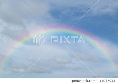 Blue sky with rainbow Blue sky with rainbow 54017933