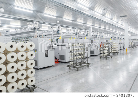 production of threads in a textile factory production of threads in a textile factory 54018073