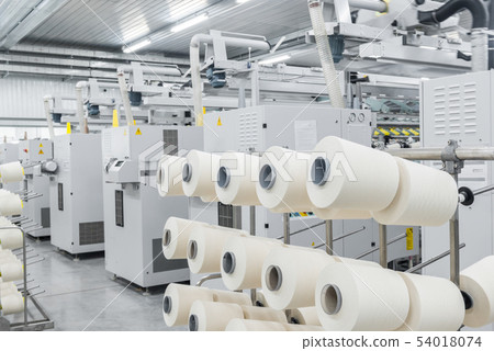 production of threads in a textile factory 54018074