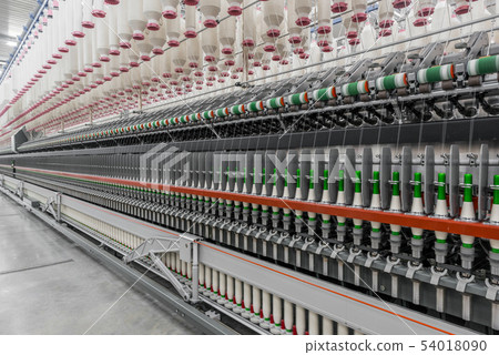 spools of thread at a textile factory 54018090