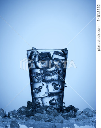 plastic bottle and a glass with ice 54018862