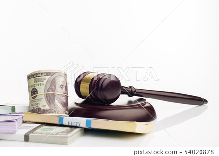 Judge's gavel and packs of dollars and euro Judge's gavel and packs of dollars and euro 54020878