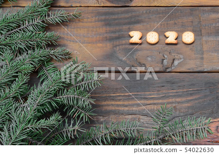 Tangerines, cracker 2020 digits and fir branches Tangerines, cracker 2020 digits and fir branches 54022630