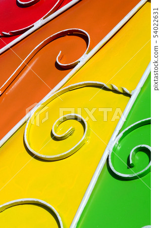 Metal texture of a piece of colored wall with a Metal texture of a piece of colored wall with a 54022631