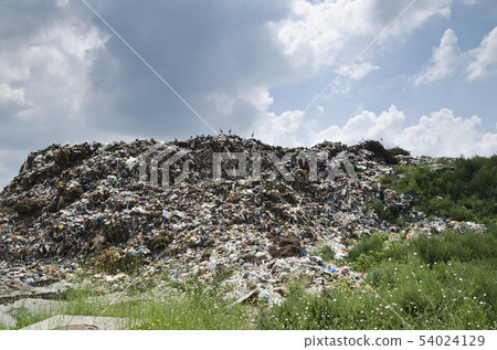 Pollution concept. Garbage pile in trash dump or Pollution concept. Garbage pile in trash dump or 54024129