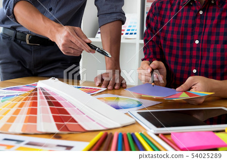 Graphic designers choose color bands samples. 54025289