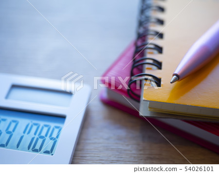 Business image · notebook · calculator · female 54026101