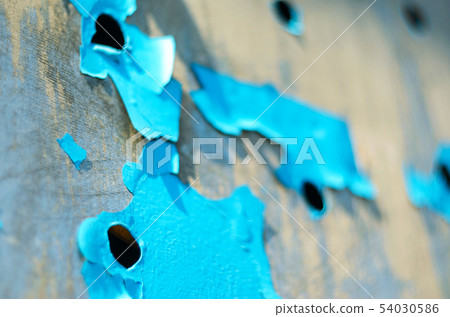 Perforated Steel Sheet with Peeling Blue Paint. 54030586