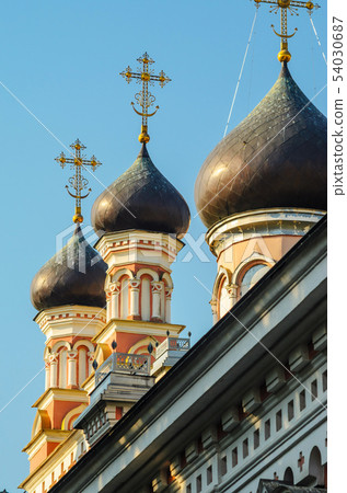 Three Copper Domes with Gilded Crosses Three Copper Domes with Gilded Crosses 54030687
