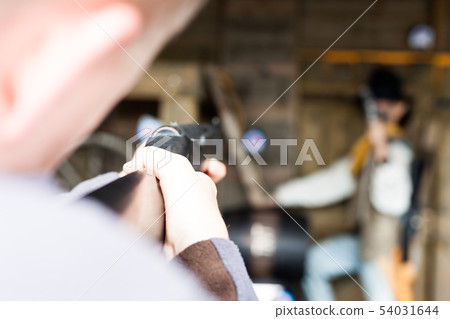 Man Aiming on Blurry Human Dummy Rancher Target in Man Aiming on Blurry Human Dummy Rancher Target in 54031644