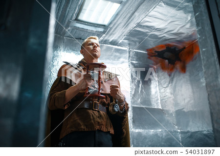 Space traveler looks out of the teleport, shuttle 54031897