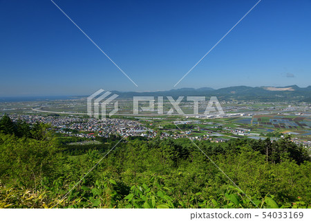 Taking a picture of the early summer landscape of the Ono Plain from the sunny Hokkaido Nanae Town Johsu Skyline Taking a picture of the early summer landscape of the Ono Plain from the sunny Hokkaido Nanae Town Johsu Skyline 54033169