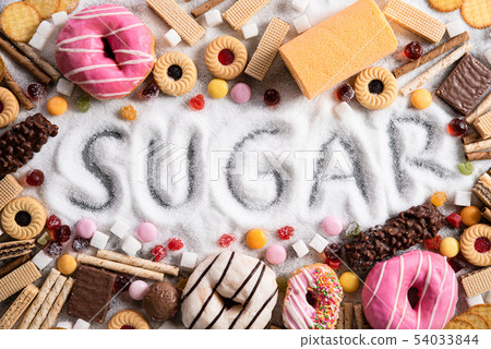 Food containing sugar. mix of sweets Food containing sugar. mix of sweets 54033844