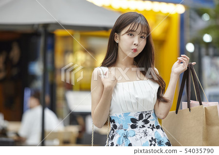 Shopping mall, shopping center, shopping, shopper holly, young woman Shopping mall, shopping center, shopping, shopper holly, young woman 54035790