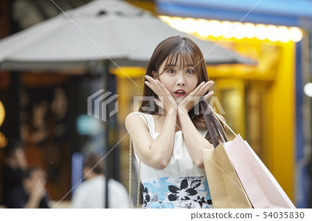Shopping mall, shopping center, shopping, shopper holly, young woman Shopping mall, shopping center, shopping, shopper holly, young woman 54035830