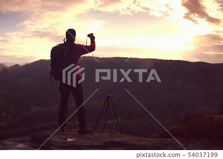 Target of traveler with backpack. Hiker makes 54037199