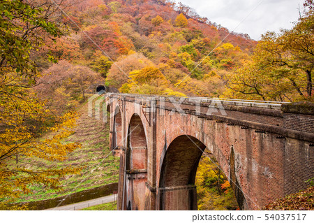 Usui Pass in Autumn: Usui No. 3 Bridge in Autumn Leaves (Megane Bridge) 54037517