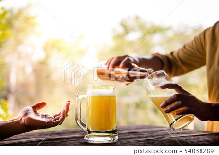 Friendship Concept. Two Friends Drinking Beer and Friendship Concept. Two Friends Drinking Beer and 54038289