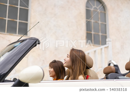 Finish a meal in a fashionable city café and go out in the open car and feel at home Finish a meal in a fashionable city café and go out in the open car and feel at home 54038318