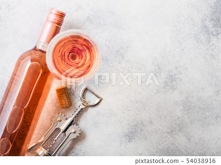 Bottle and glasses of pink rose wine with cork Bottle and glasses of pink rose wine with cork 54038916