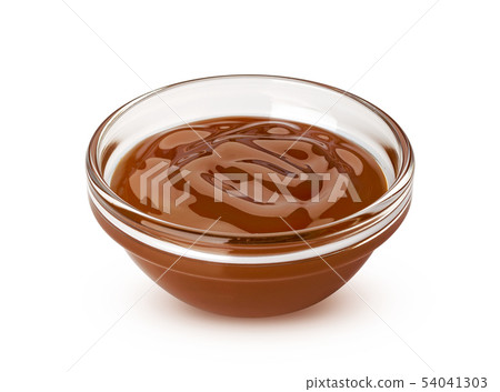 Caramel sauce isolated on white background 54041303