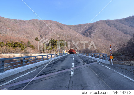 Shot the spring landscape of the Motatsu Tunnel in sunny Hokkaido town Shot the spring landscape of the Motatsu Tunnel in sunny Hokkaido town 54044730
