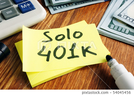 Solo 401k concept. Piece of paper and calculator. 54045456