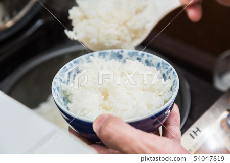 Let's eat rice from rice cooker hand Let's eat rice from rice cooker hand 54047819