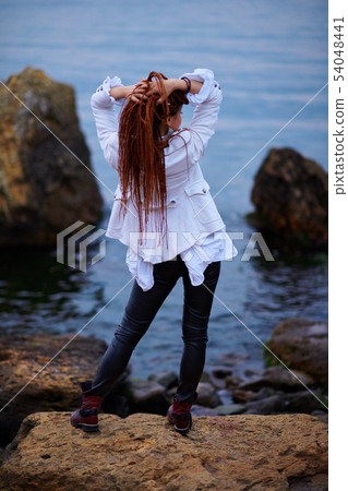 dreadlocks fashionable girl dressed in white dreadlocks fashionable girl dressed in white 54048441
