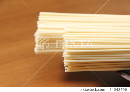 Hand-boiled hyamugi (dried noodles). 54048796